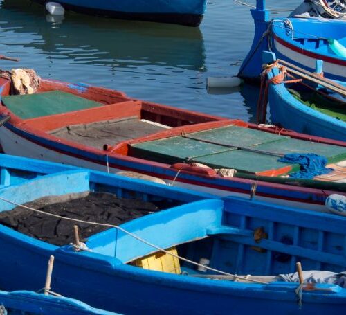 Typical blue boats you can spot alongside Bari's lungomare