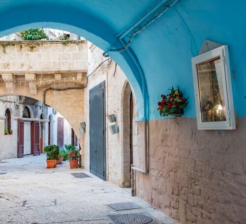 Blue tunnel and arch in one street in Bari Old Town