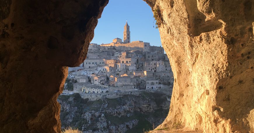 Matera from a stone window in the caves